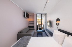 Flamingo 207: Modern Apt with Balcony